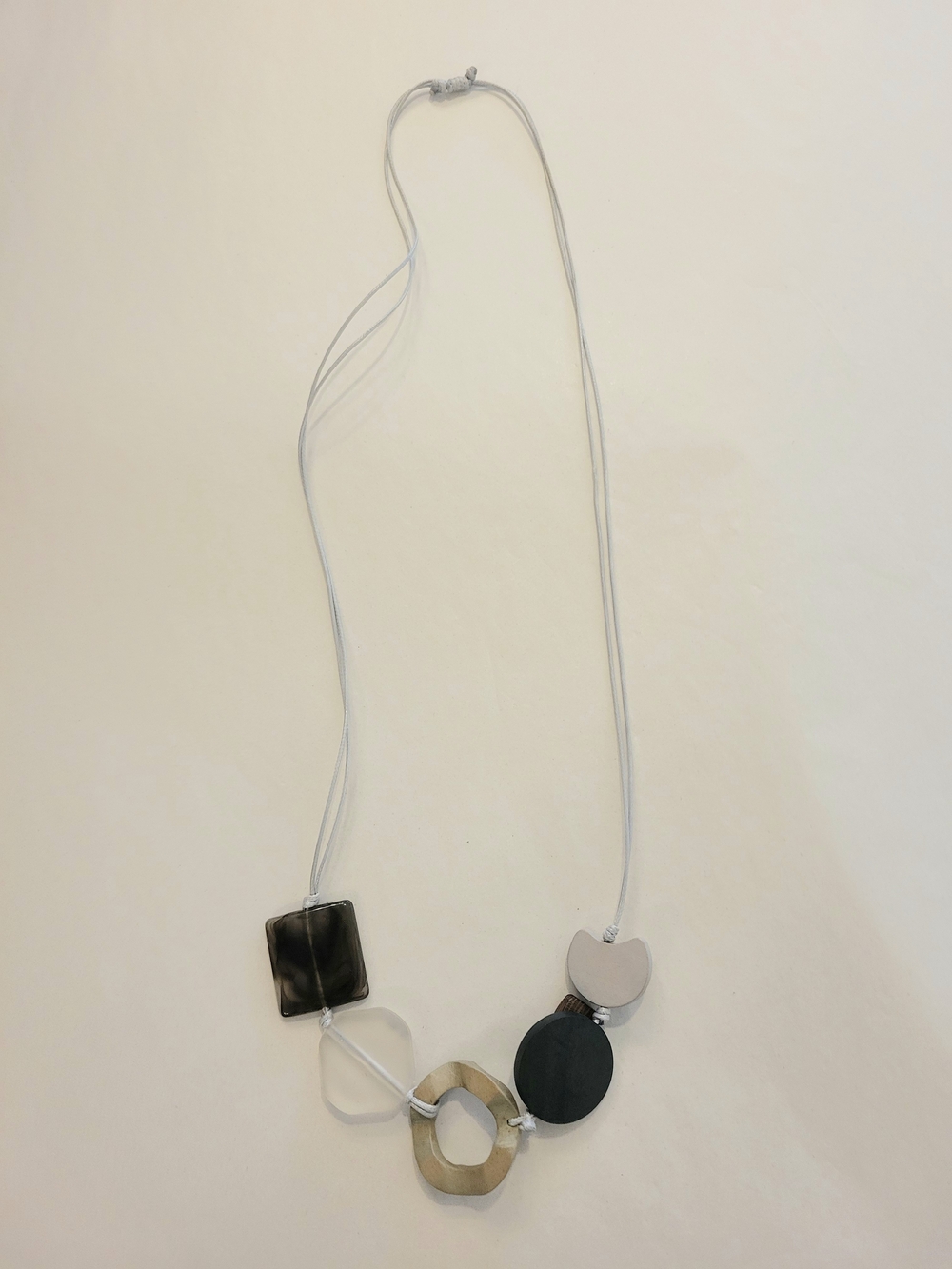 Modern Geometric Pendant Necklace in Black, Silver and Cream